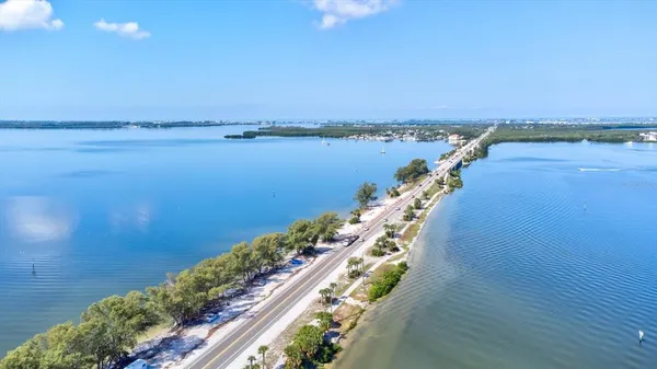 a view of an ocean with city