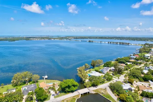 a view of a swimming pool with a garden