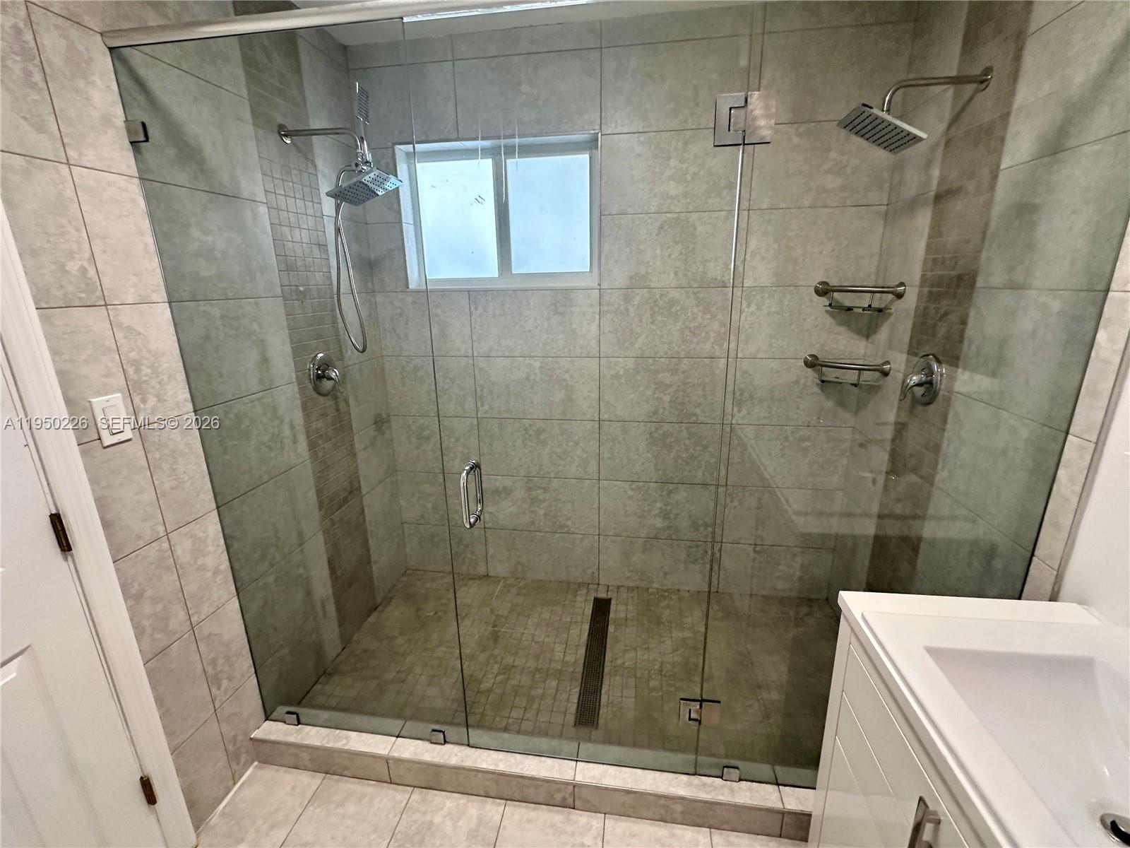 1811 Southwest 83rd Avenue Miami, FL 33155 - Photo 15 of 24 a bathroom with a shower and toilet