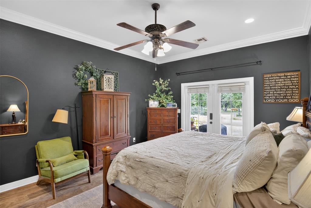 11868 Timber Ridge Drive Keithville, LA 71047 - Photo 15 of 37 Room featuring dark gray walls and wood-finish flooring