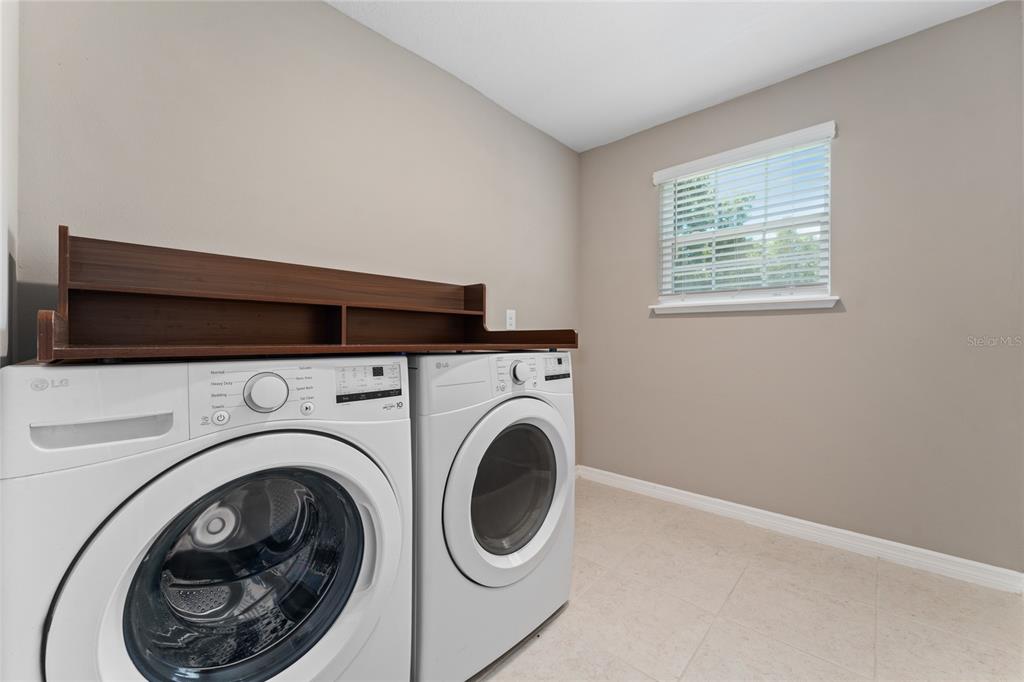4331 Wayne Road Fruitland Park, FL 34731 - Photo 41 of 46 a view of entryway with washer and dryer