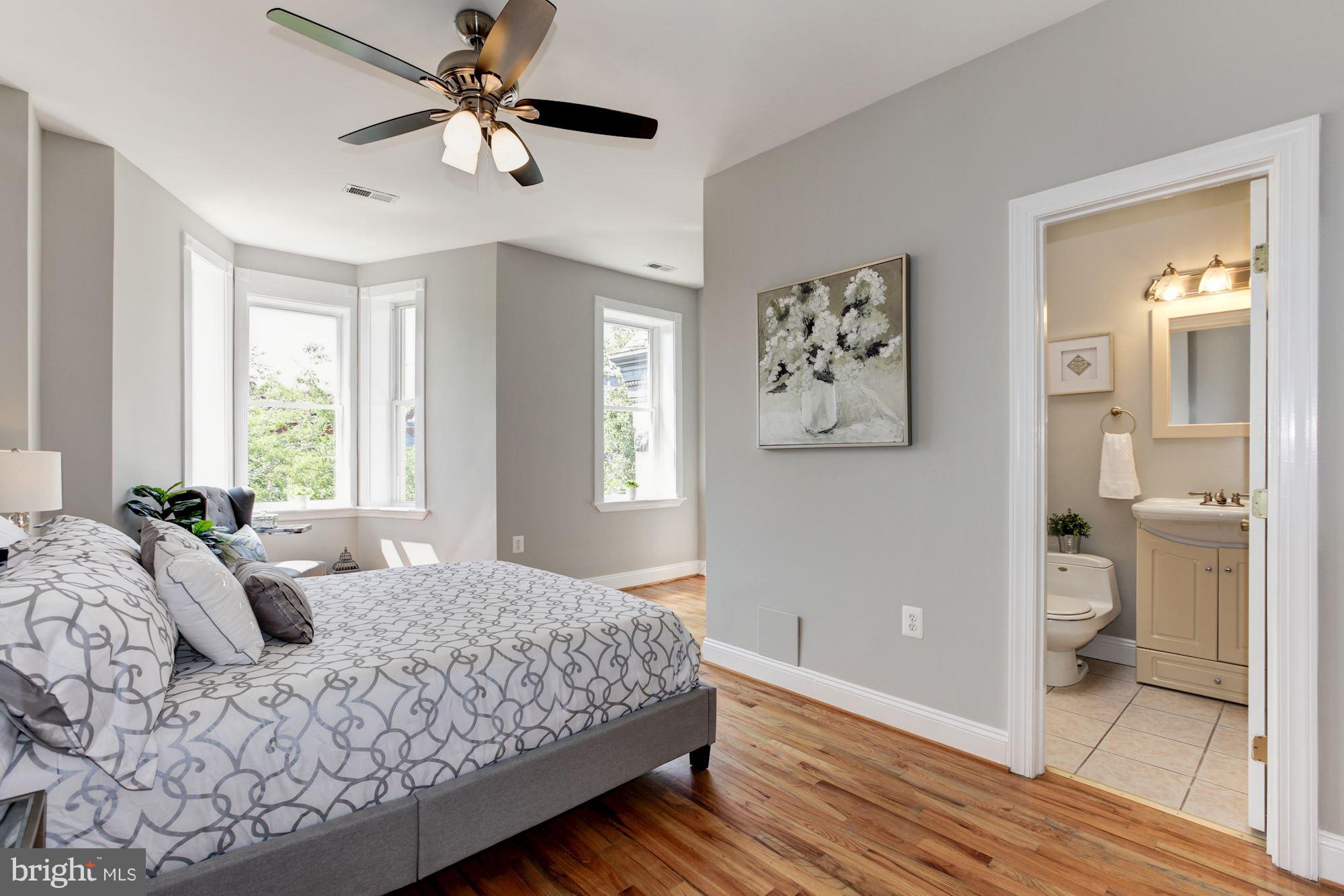 53 R Street Northwest Washington, DC 20001 - Photo 13 of 30 Large master bedroom with en-suite bath