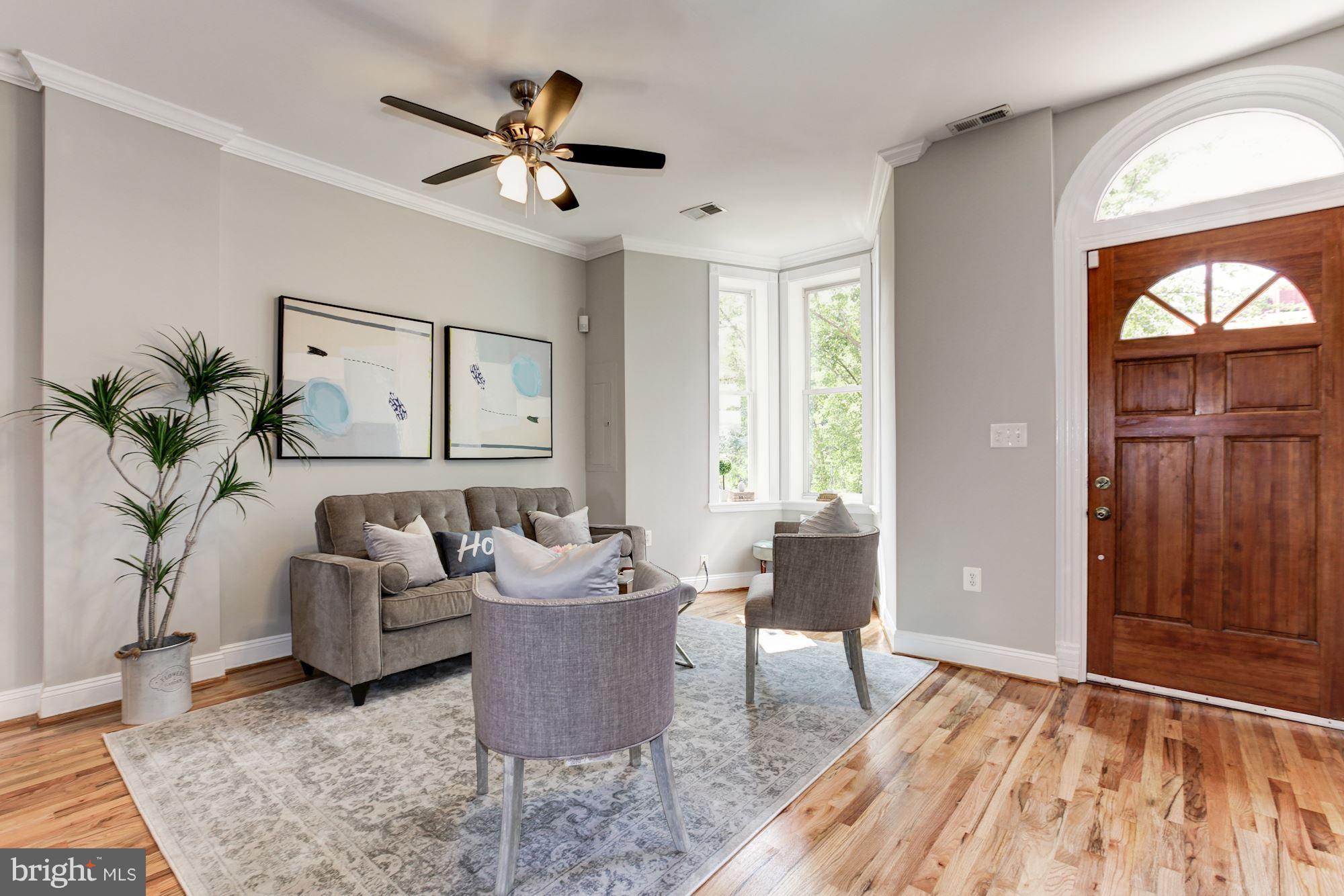 53 R Street Northwest Washington, DC 20001 - Photo 3 of 30 Light-filled living room with bay window