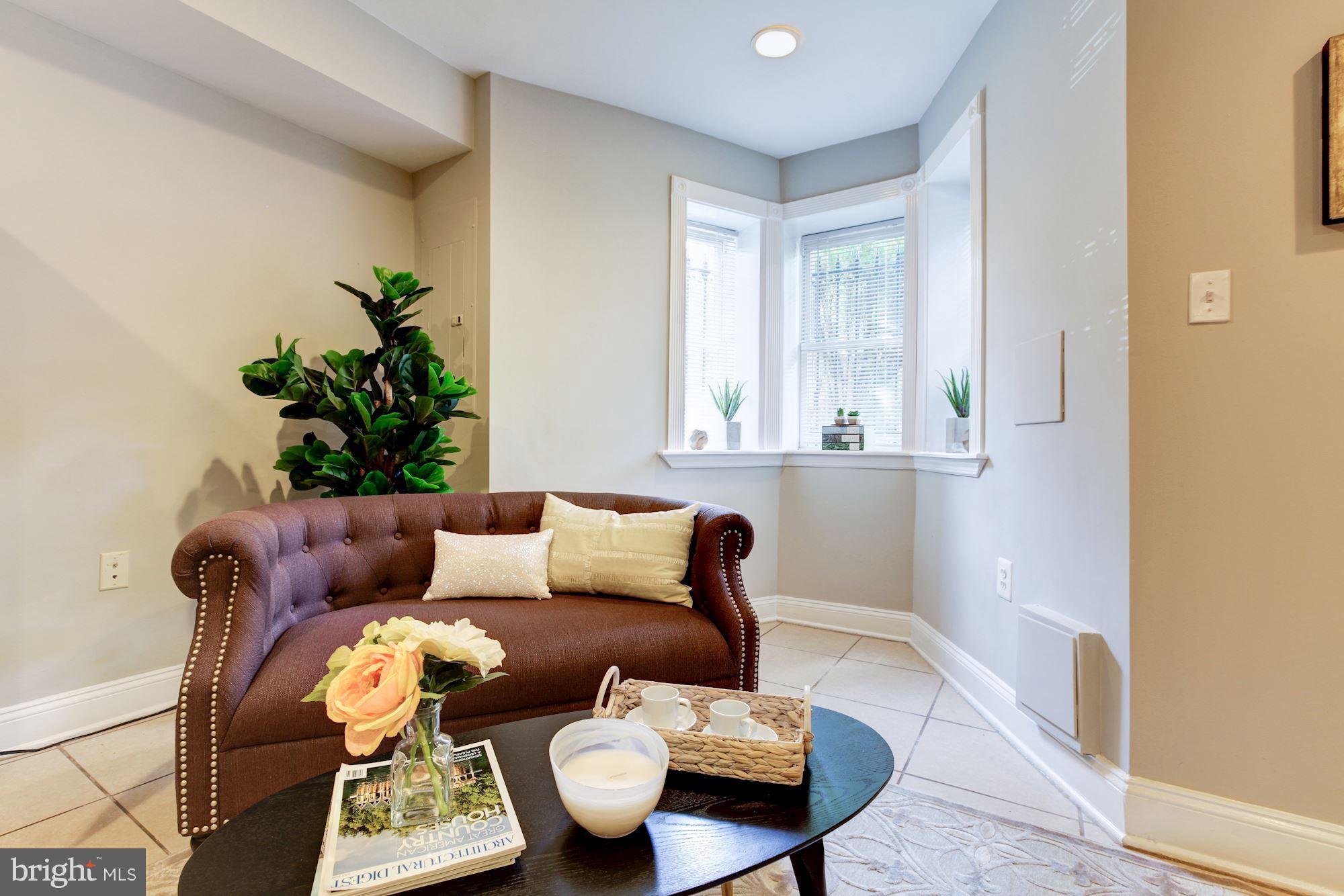 53 R Street Northwest Washington, DC 20001 - Photo 22 of 30 LL unit w/ living room w/ bay window