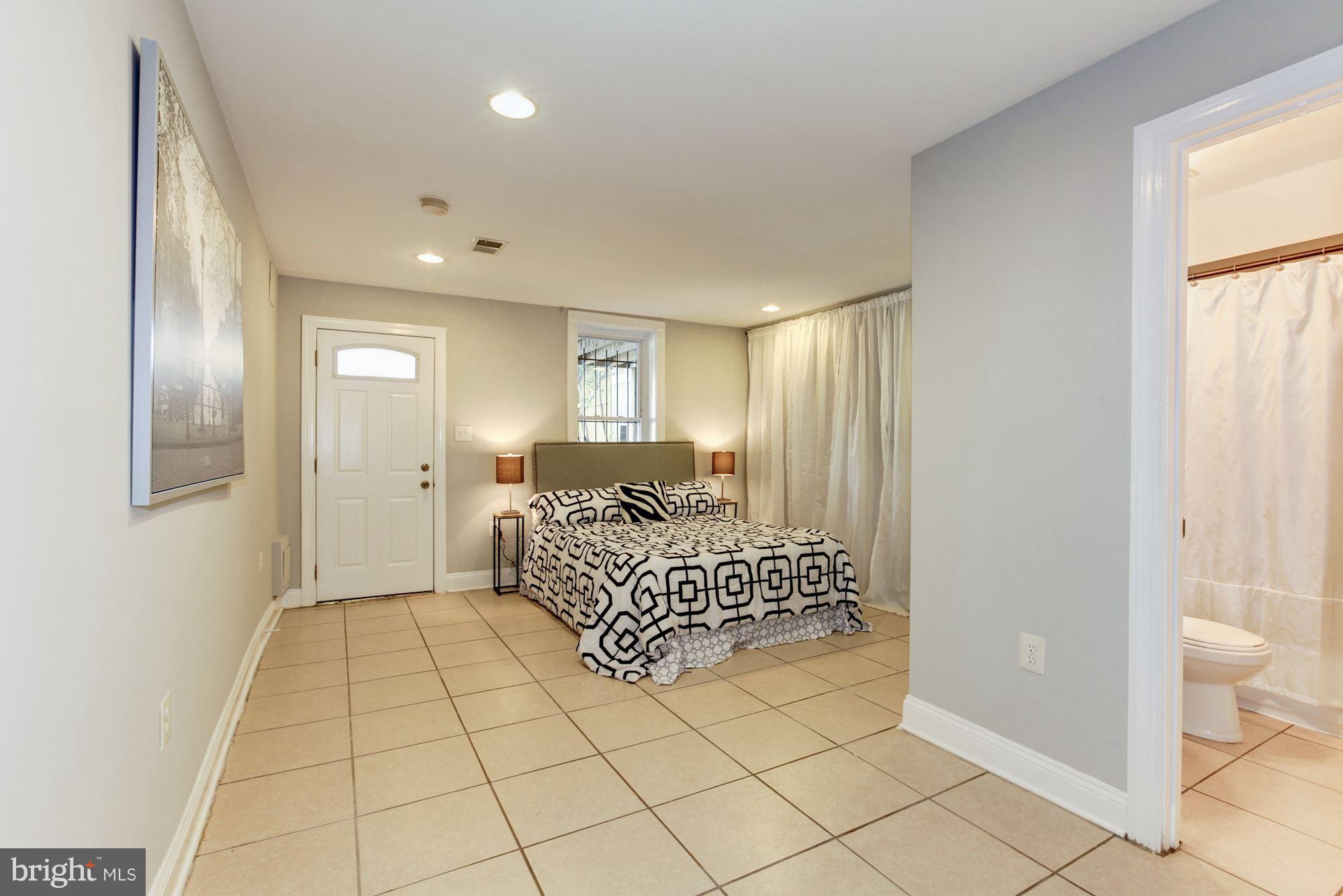 53 R Street Northwest Washington, DC 20001 - Photo 23 of 30 Huge master bedroom in LL unit w/ sep ent