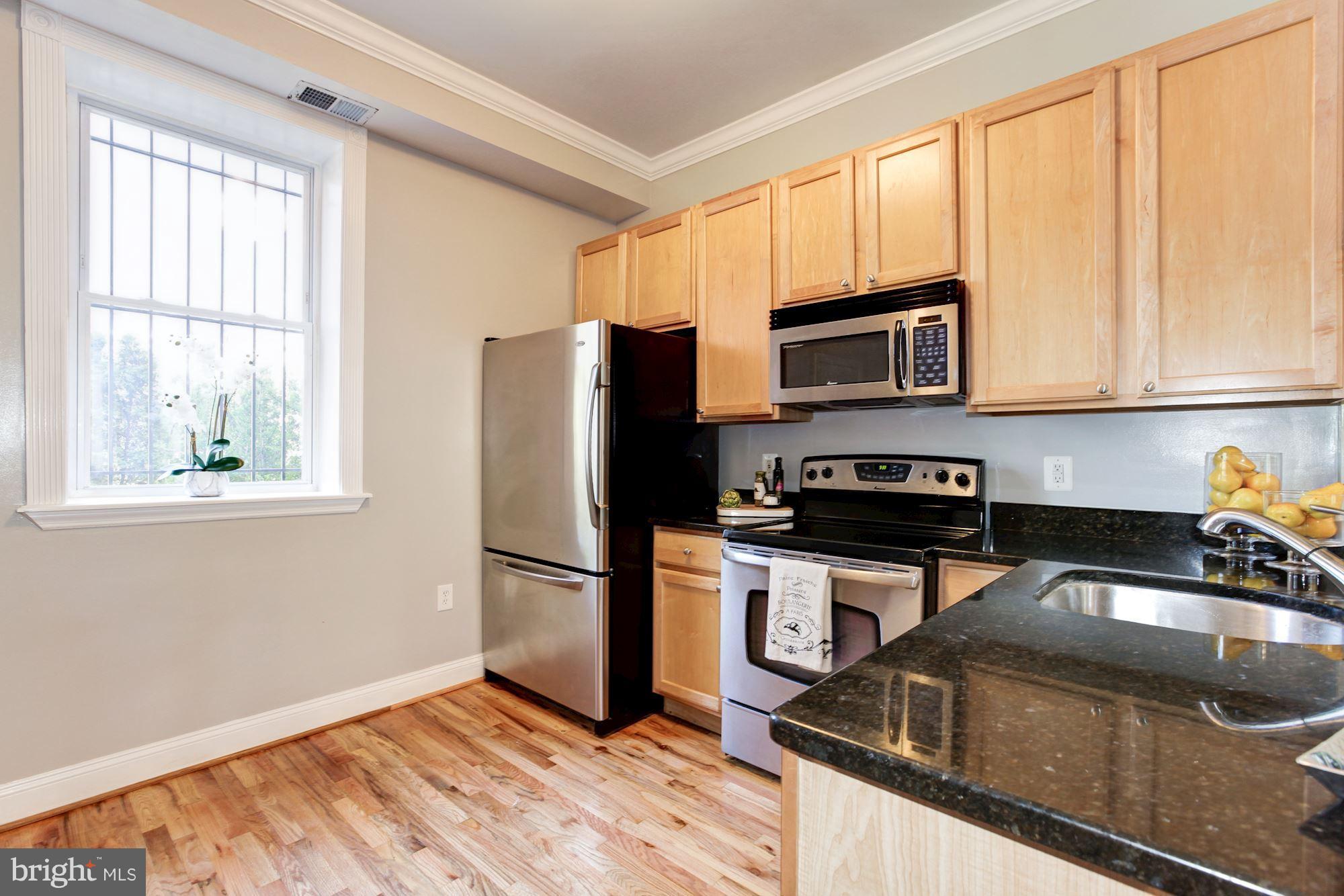 53 R Street Northwest Washington, DC 20001 - Photo 9 of 30 Kitchen with stainless steel appliances