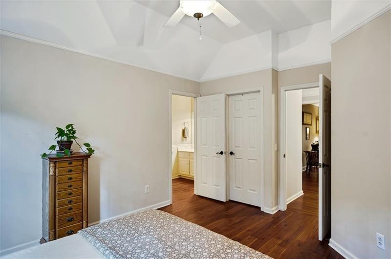 1170 Spring Oak Way Cumming, GA 30041 - Photo 44 of 77 a view of an empty room with window and wooden floor