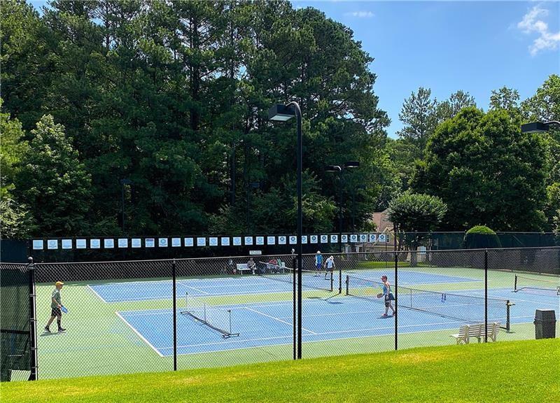 1170 Spring Oak Way Cumming, GA 30041 - Photo 75 of 77 a view of a swimming pool with an outdoor space