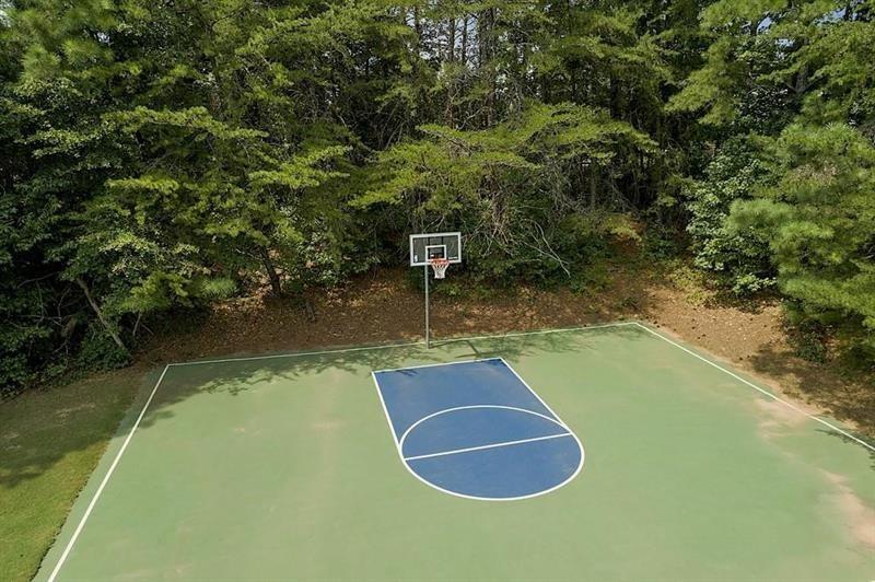 1170 Spring Oak Way Cumming, GA 30041 - Photo 76 of 77 a view of a swimming pool with a yard