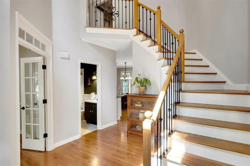 1170 Spring Oak Way Cumming, GA 30041 - Photo 10 of 77 a view of entryway and hall with wooden floor