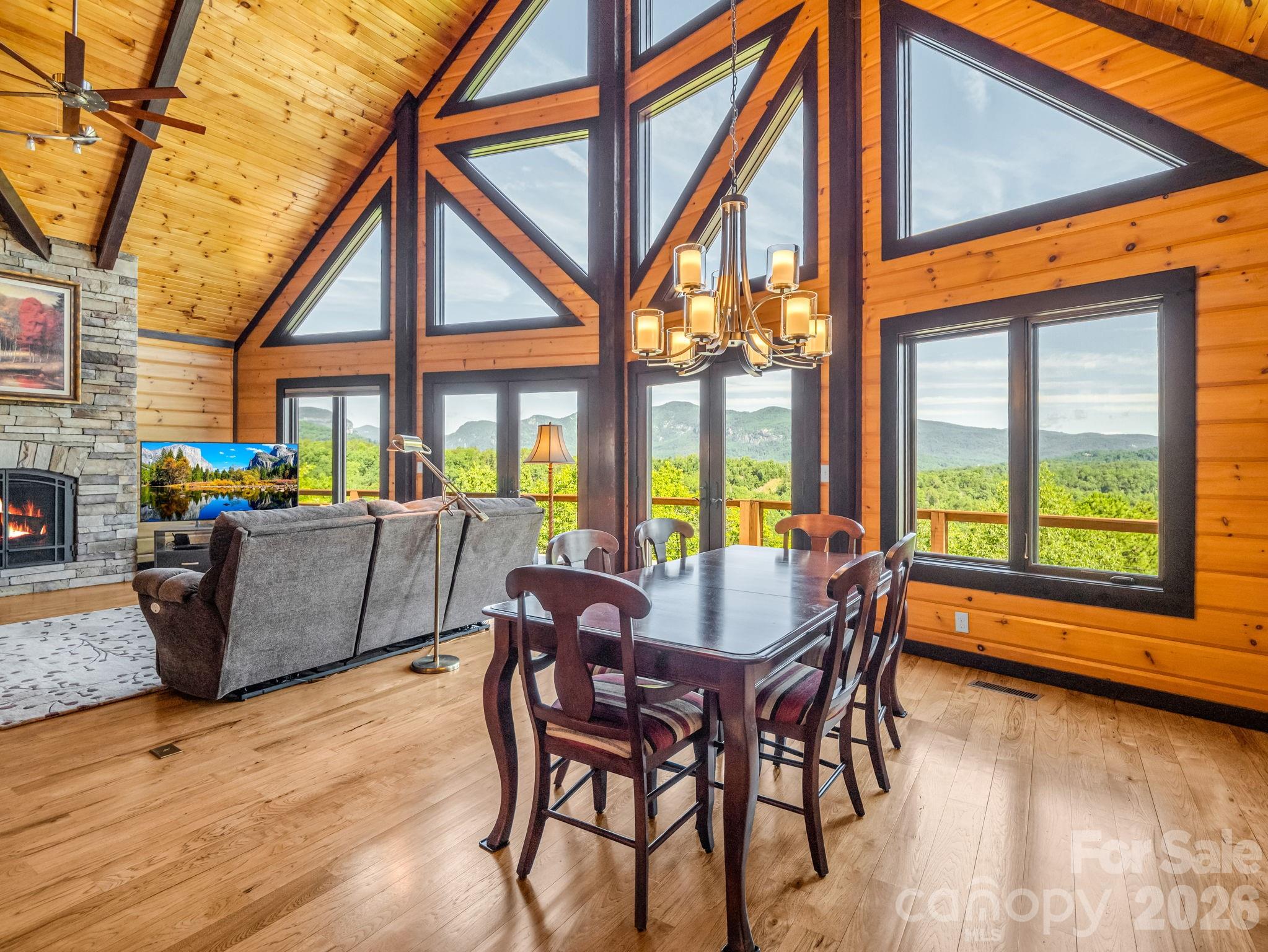 590 Boulder Ridge Lake Lure, NC 28746 - Photo 12 of 48 a dining room with furniture and wooden floor