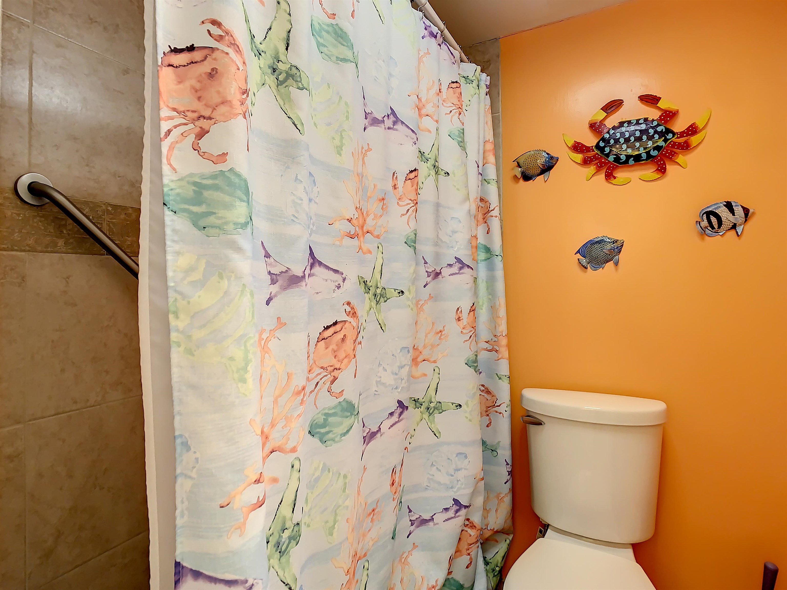 2 Dondanville Road, Unit 110 St. Augustine, FL 32080 - Photo 25 of 38 a bathroom with a toilet and shower curtain