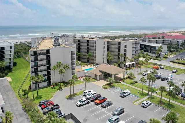 a picture of city view with a table and chairs