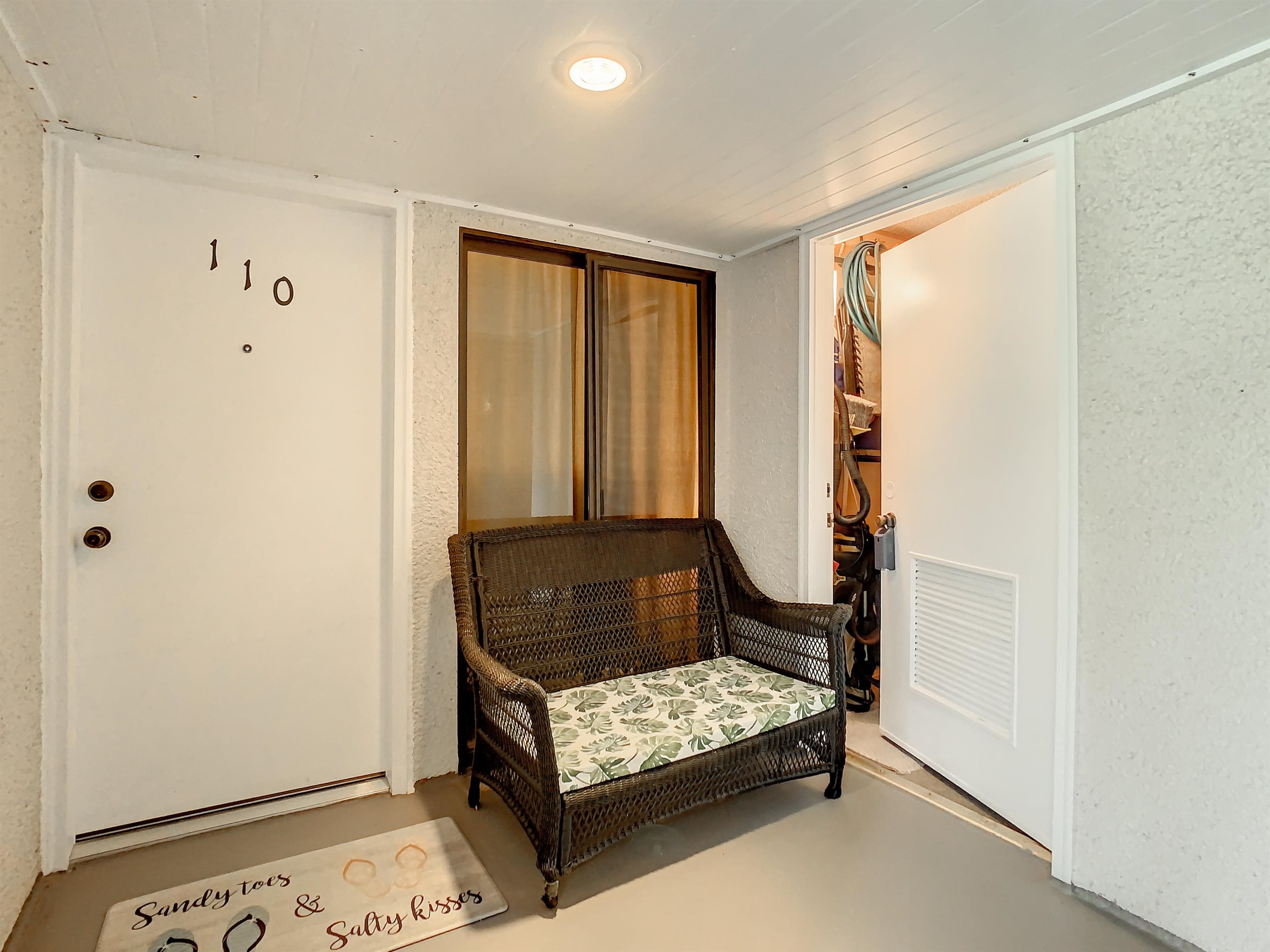 2 Dondanville Road, Unit 110 St. Augustine, FL 32080 - Photo 8 of 38 a bedroom with a bed and a window