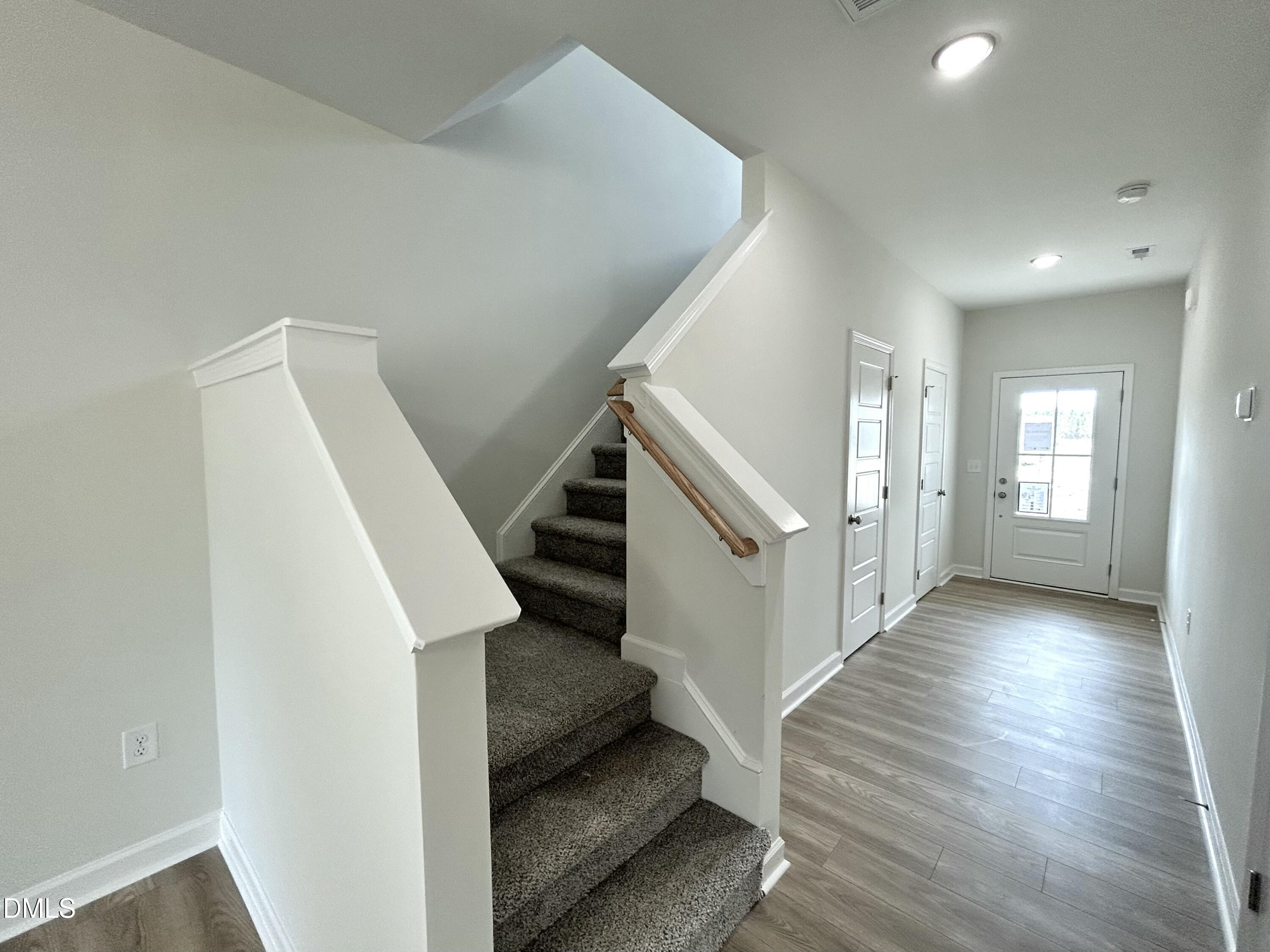 1739 Cardinal Drive Deep Run, NC 28525 - Photo 19 of 29 a view of entryway and hall with wooden floor
