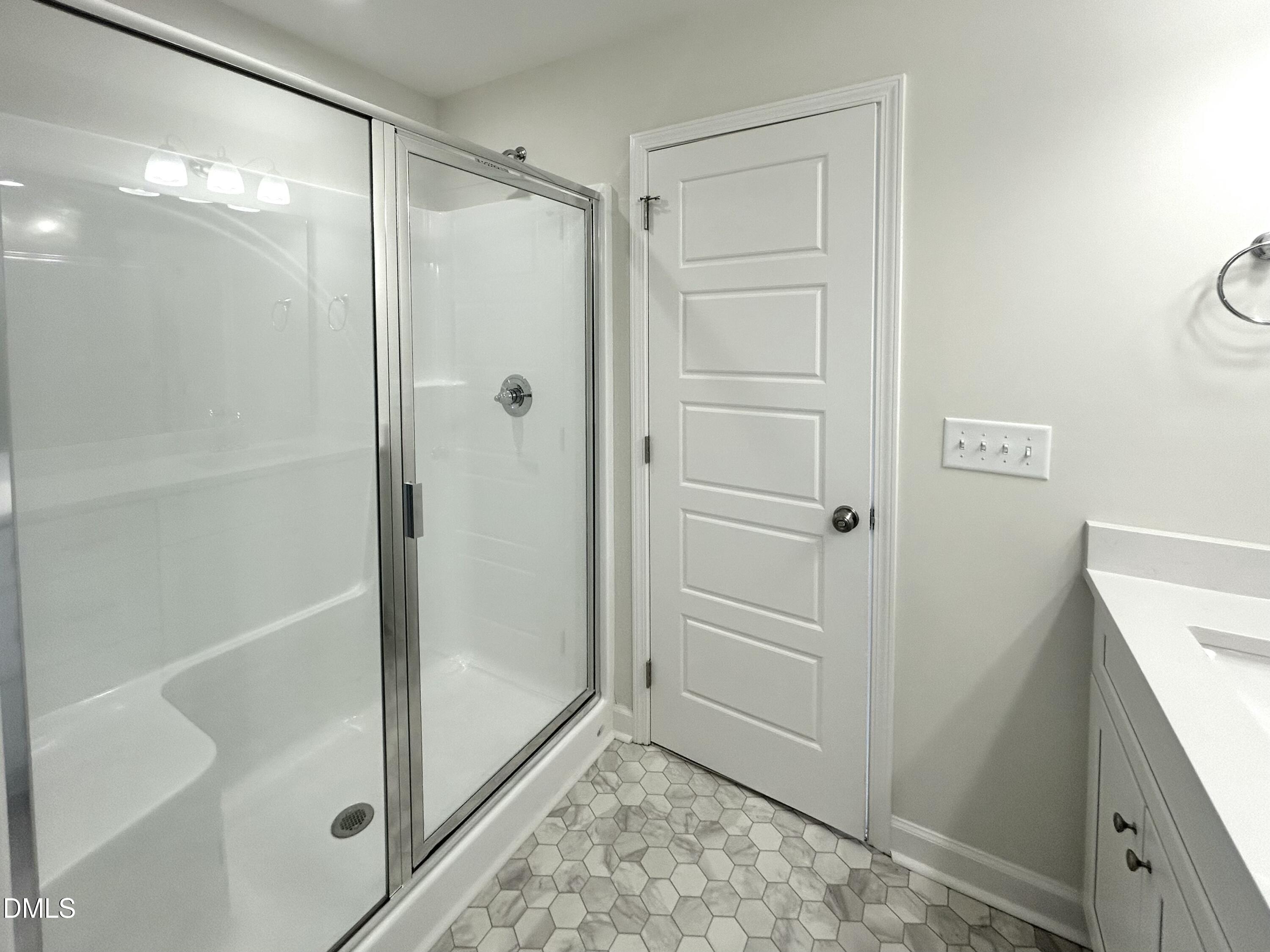 1739 Cardinal Drive Deep Run, NC 28525 - Photo 28 of 29 a bathroom with a shower and a sink