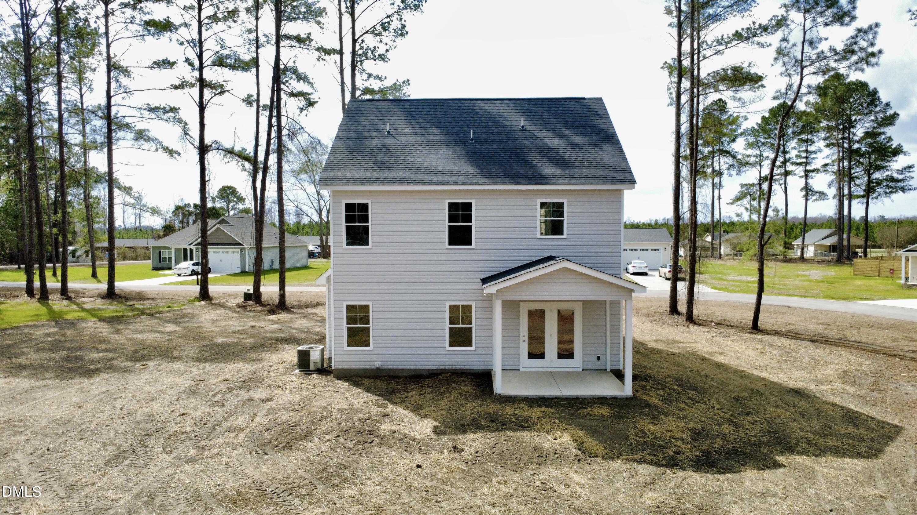 1739 Cardinal Drive Deep Run, NC 28525 - Photo 4 of 29 a view of a house with a yard and large tree
