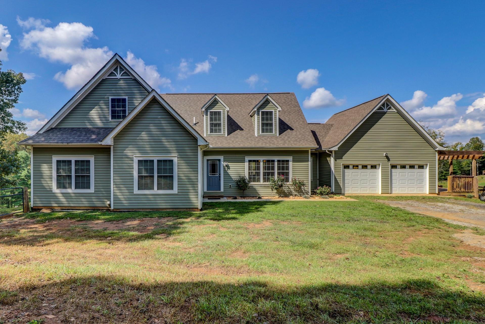 1491 Epperly Mill Road Southwest Floyd, VA 24091 - Photo 1 of 48 a front view of a house with garden