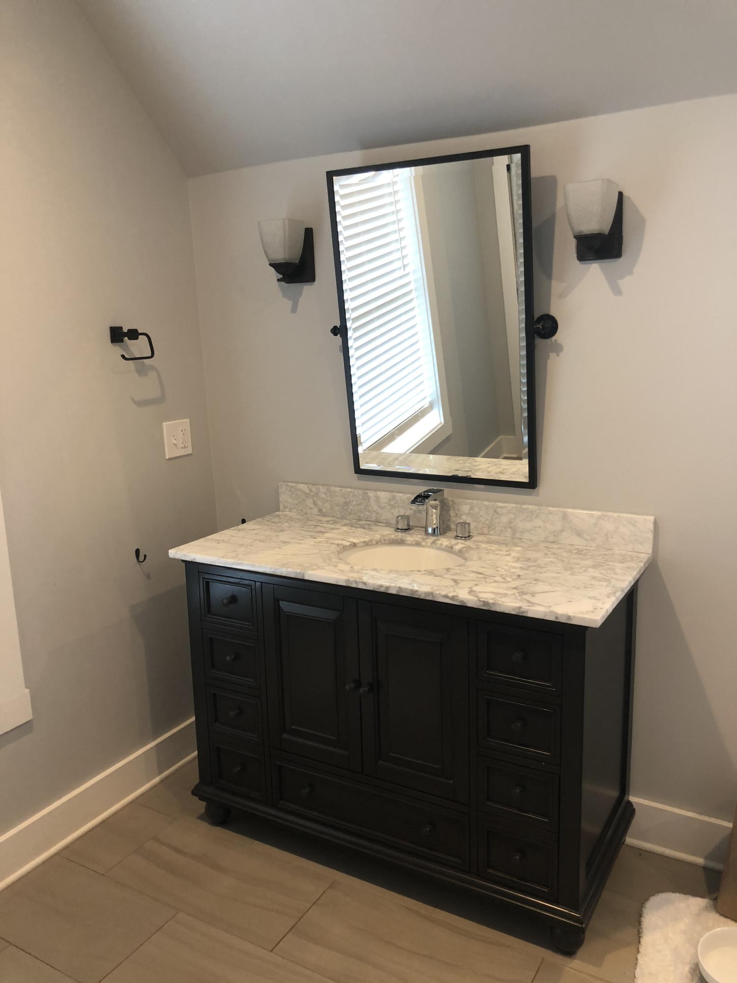 1491 Epperly Mill Road Southwest Floyd, VA 24091 - Photo 15 of 48 a bathroom with a sink vanity and mirror