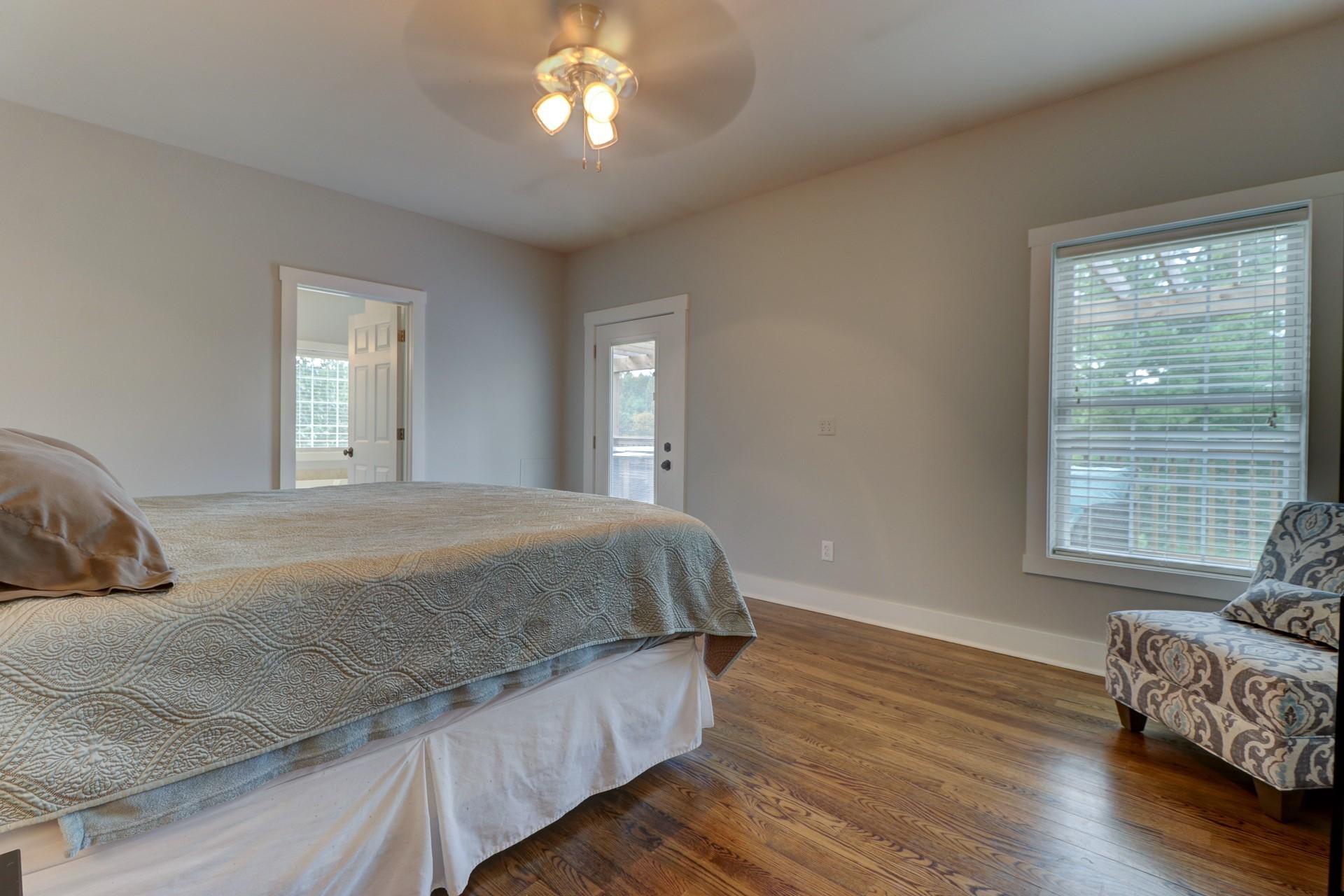 1491 Epperly Mill Road Southwest Floyd, VA 24091 - Photo 16 of 48 a bedroom with a bed and wooden floor