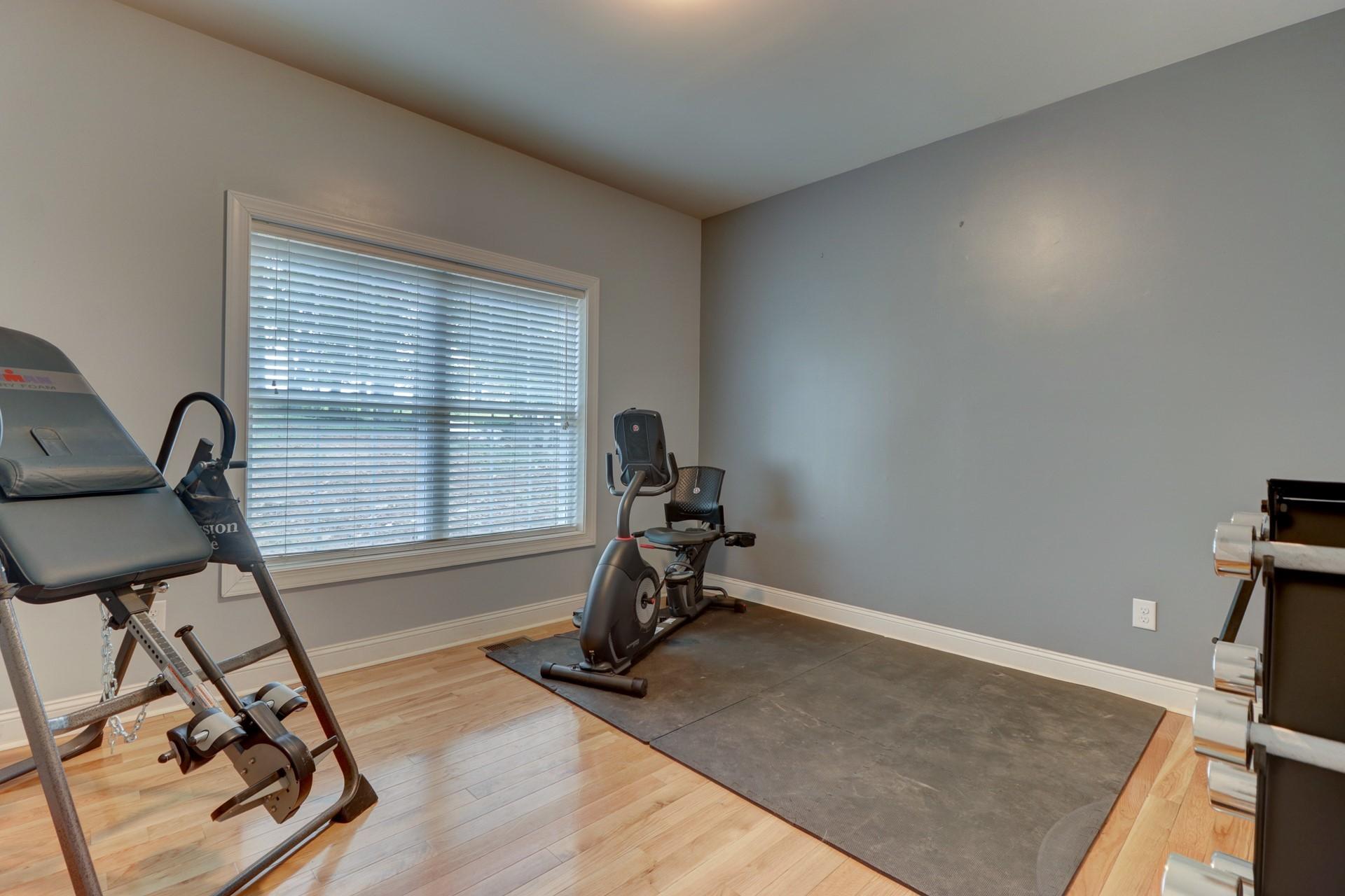 1491 Epperly Mill Road Southwest Floyd, VA 24091 - Photo 25 of 48 a view of a room with gym equipment on wooden floor