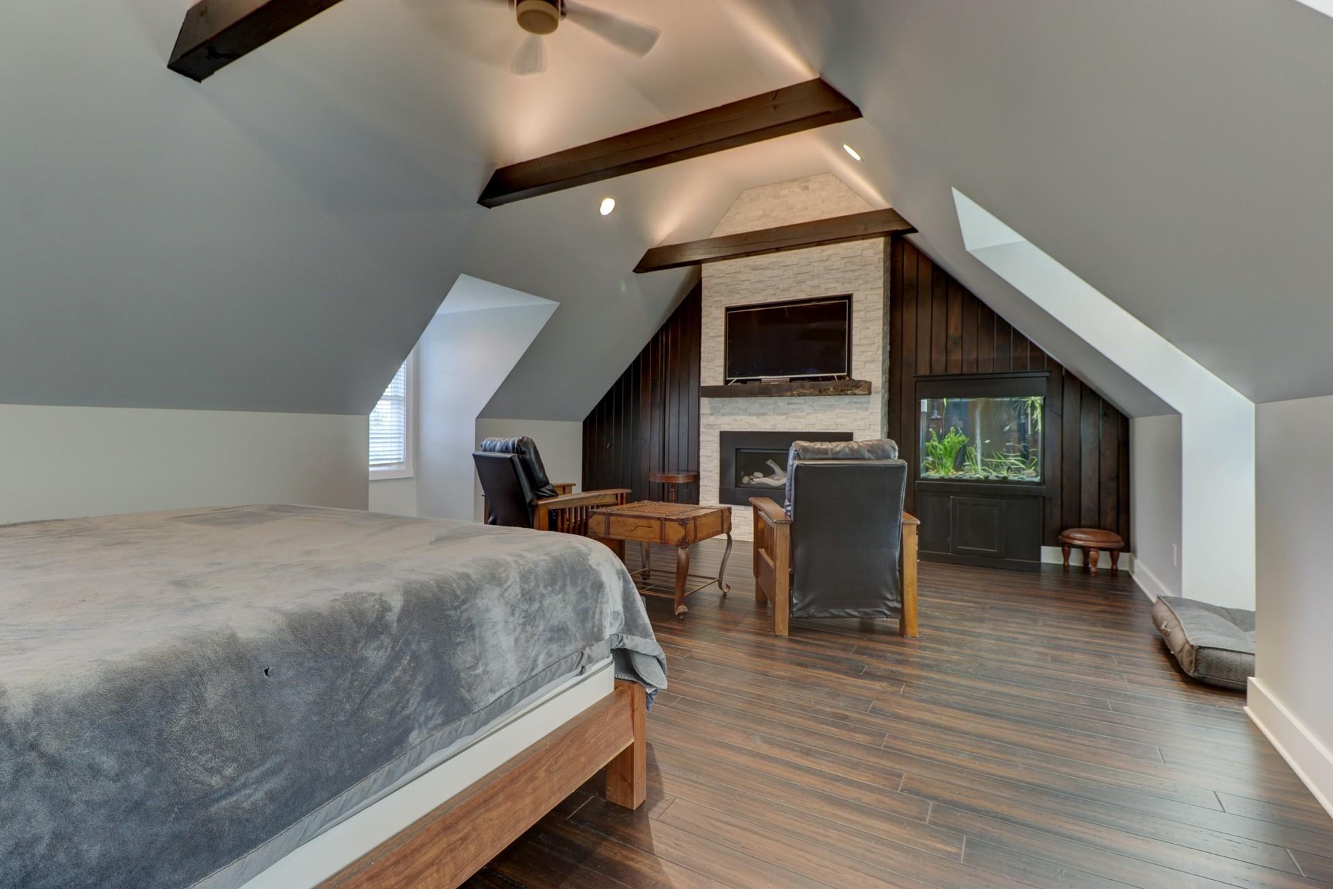 1491 Epperly Mill Road Southwest Floyd, VA 24091 - Photo 27 of 48 a bedroom with a bed and a chair