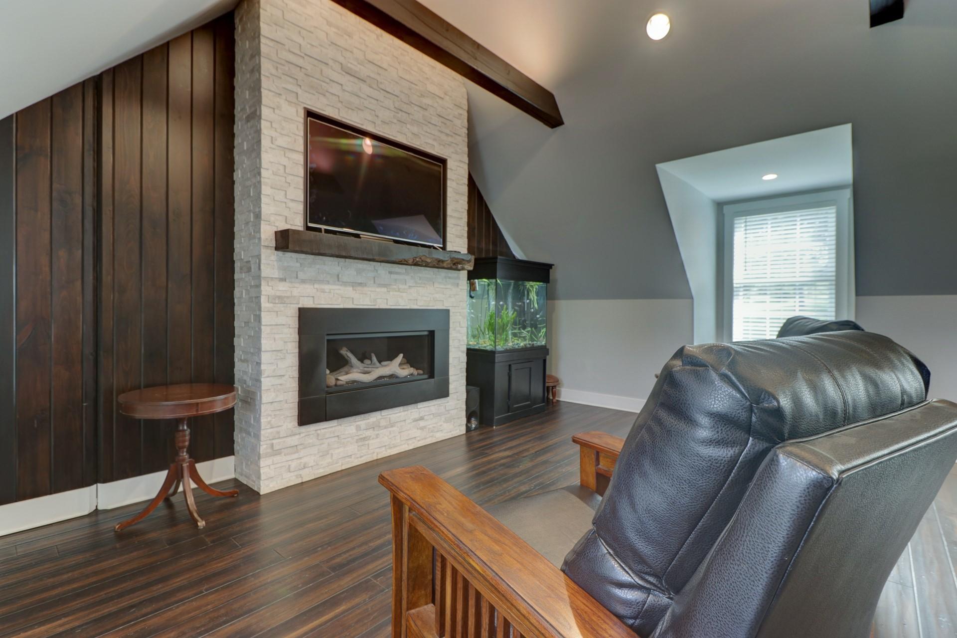 1491 Epperly Mill Road Southwest Floyd, VA 24091 - Photo 28 of 48 a living room with furniture and a fireplace
