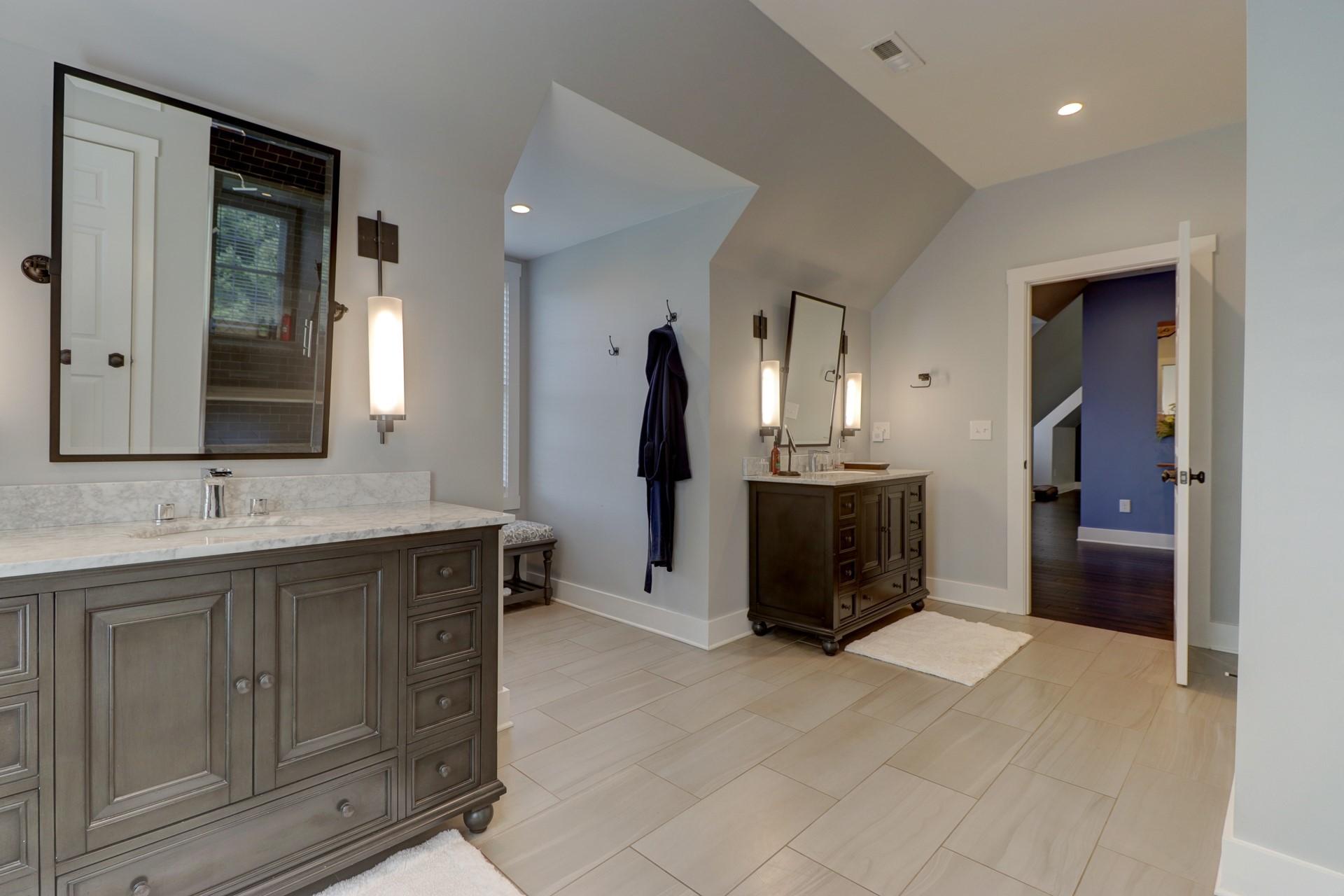 1491 Epperly Mill Road Southwest Floyd, VA 24091 - Photo 33 of 48 a spacious bathroom with a double vanity sink and a mirror