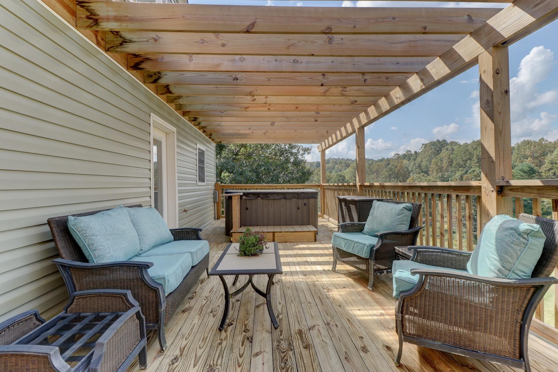 1491 Epperly Mill Road Southwest Floyd, VA 24091 - Photo 38 of 48 a roof deck with a table and chairs