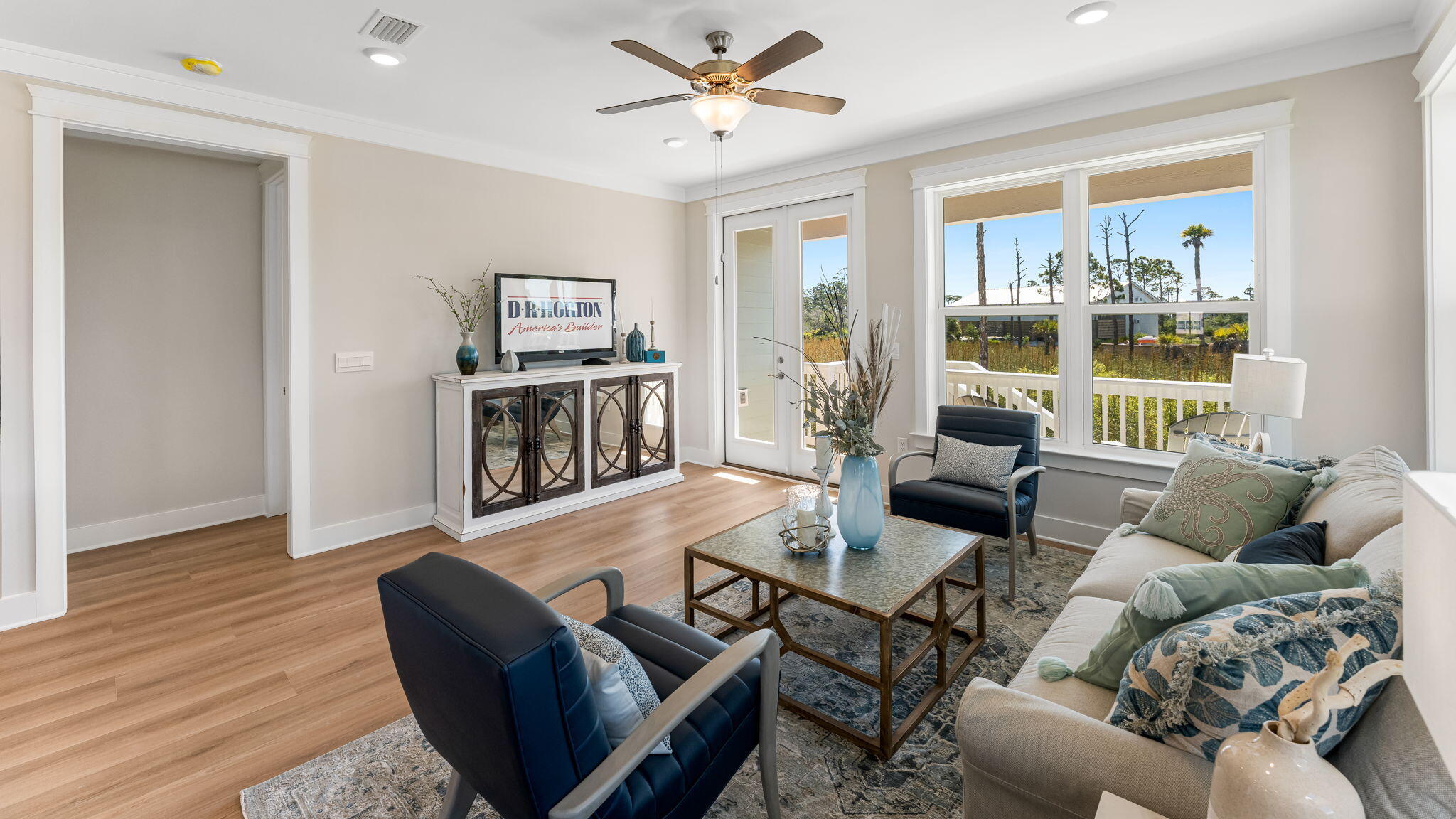 112 Marsh View Ridge Ln Cape Port St. Joe, FL 32456 - Photo 12 of 32 a living room with furniture and a window