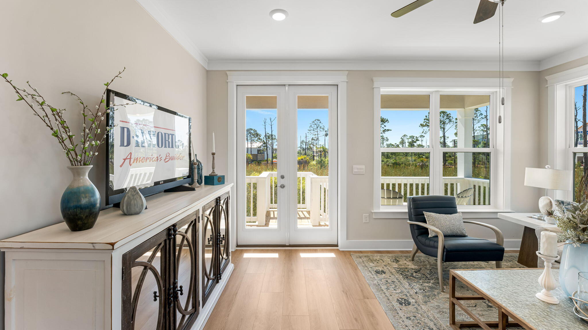 112 Marsh View Ridge Ln Cape Port St. Joe, FL 32456 - Photo 13 of 32 a living room with furniture and a large window