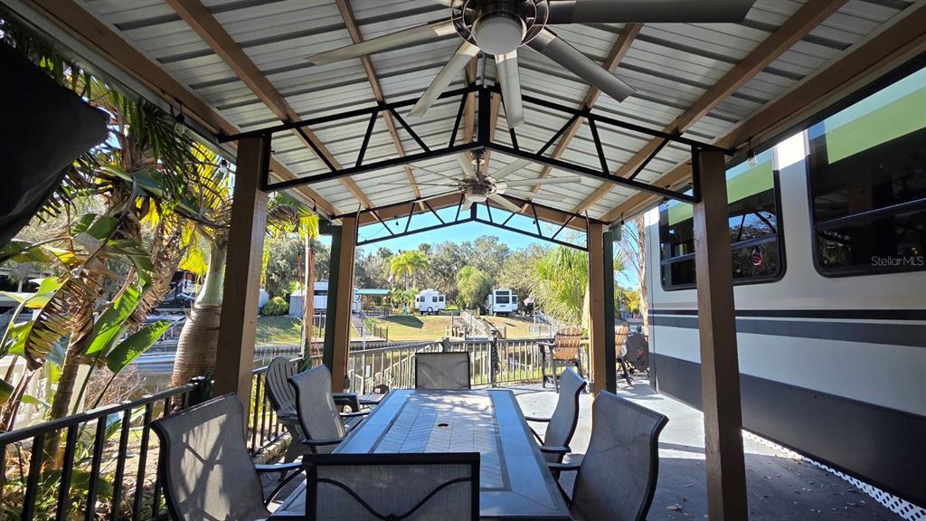 561 Waterway Drive River Ranch, FL 33867 - Photo 4 of 18 a view of a chairs and table in a room