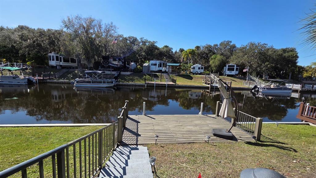561 Waterway Drive River Ranch, FL 33867 - Photo 8 of 18 a view of a lake from a balcony