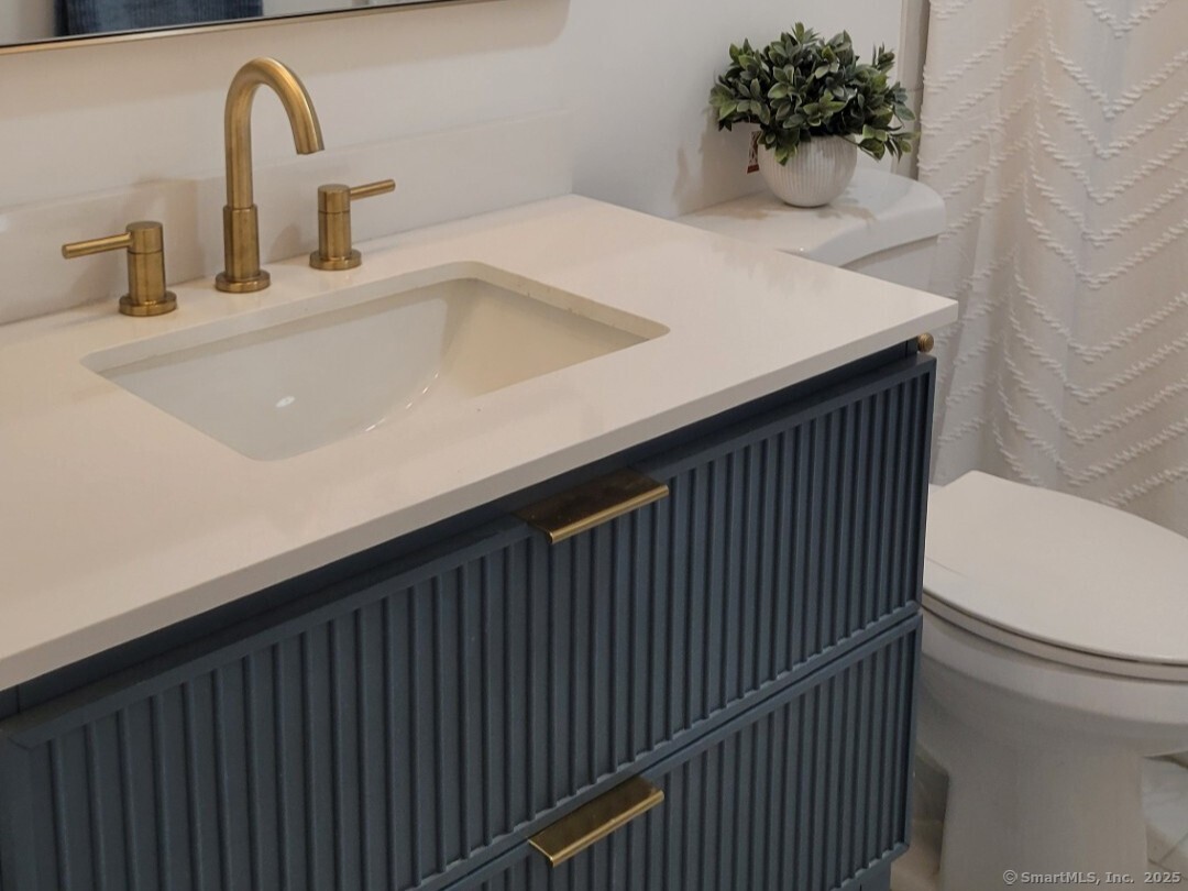 160 Fairfield Woods Road, Unit 43 Fairfield, CT 06825 - Photo 15 of 25 a close view of sink and a vanity