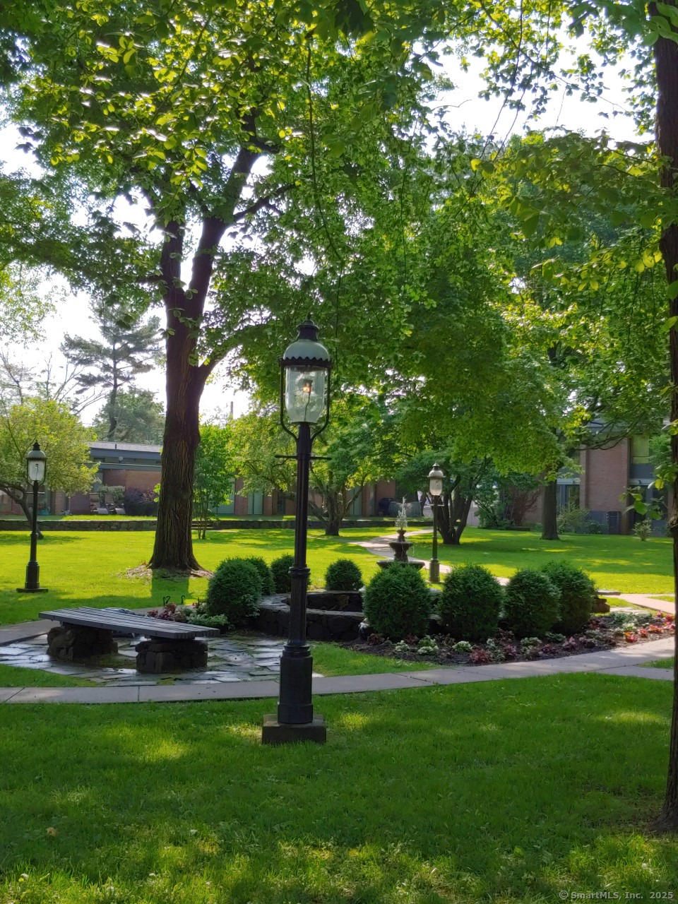 160 Fairfield Woods Road, Unit 43 Fairfield, CT 06825 - Photo 21 of 25 a view of a park with large trees