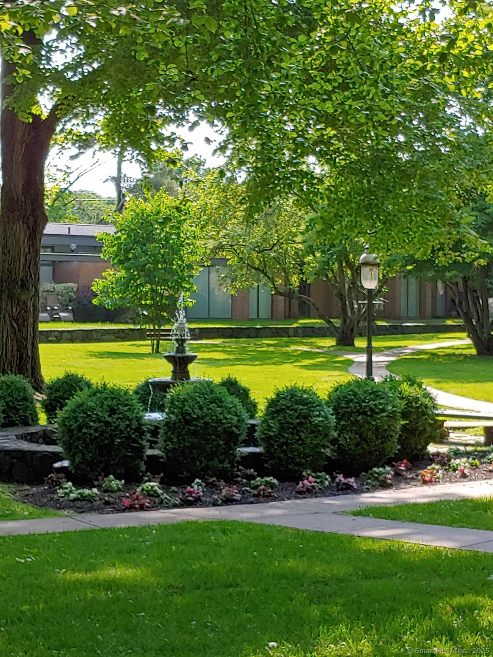 160 Fairfield Woods Road, Unit 43 Fairfield, CT 06825 - Photo 25 of 25 a view of a park with large trees