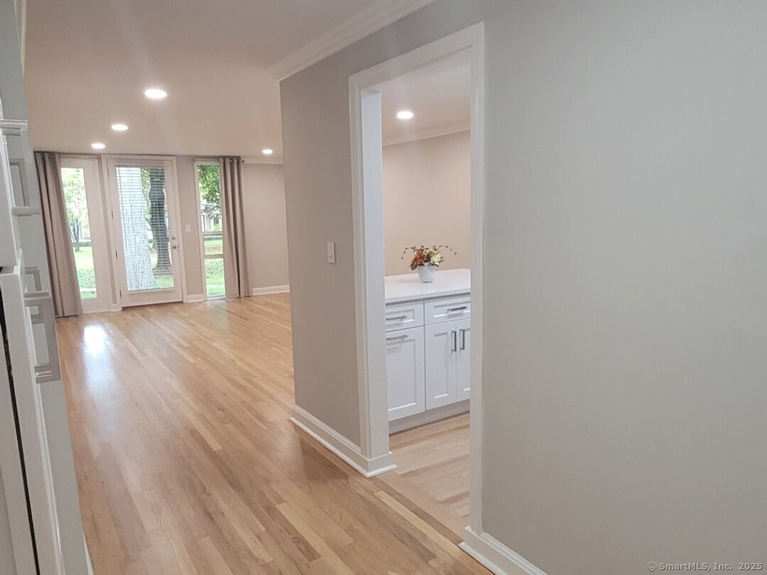 160 Fairfield Woods Road, Unit 43 Fairfield, CT 06825 - Photo 4 of 25 a view of entryway with wooden floor