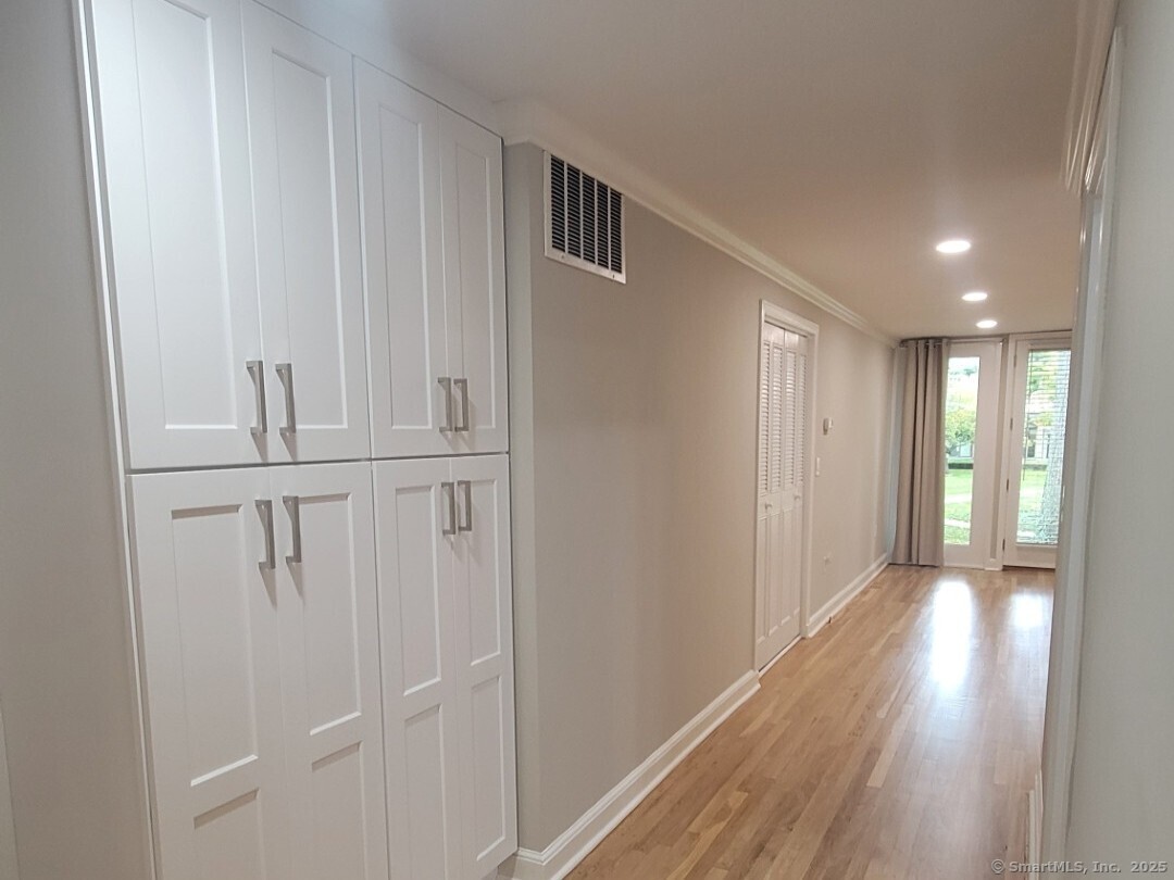 160 Fairfield Woods Road, Unit 43 Fairfield, CT 06825 - Photo 5 of 25 a view of entryway with wooden floor