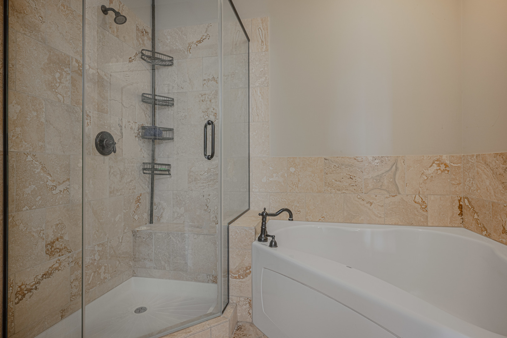 171 Partridge Lane Bartlett, IL 60103 - Photo 14 of 34 a bathroom with a bathtub and a shower