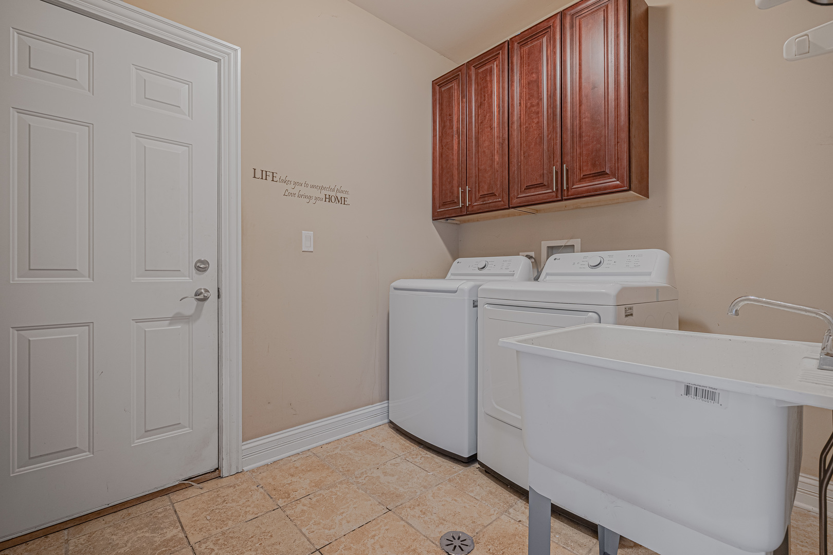 171 Partridge Lane Bartlett, IL 60103 - Photo 15 of 34 a utility room with dryer and washer