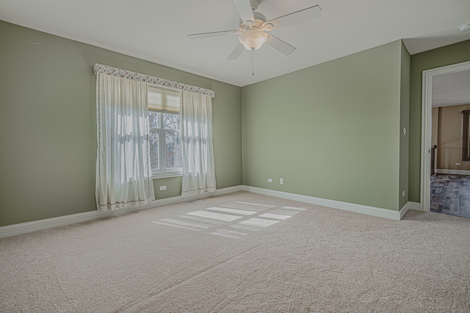 171 Partridge Lane Bartlett, IL 60103 - Photo 24 of 34 a view of an empty room with a window