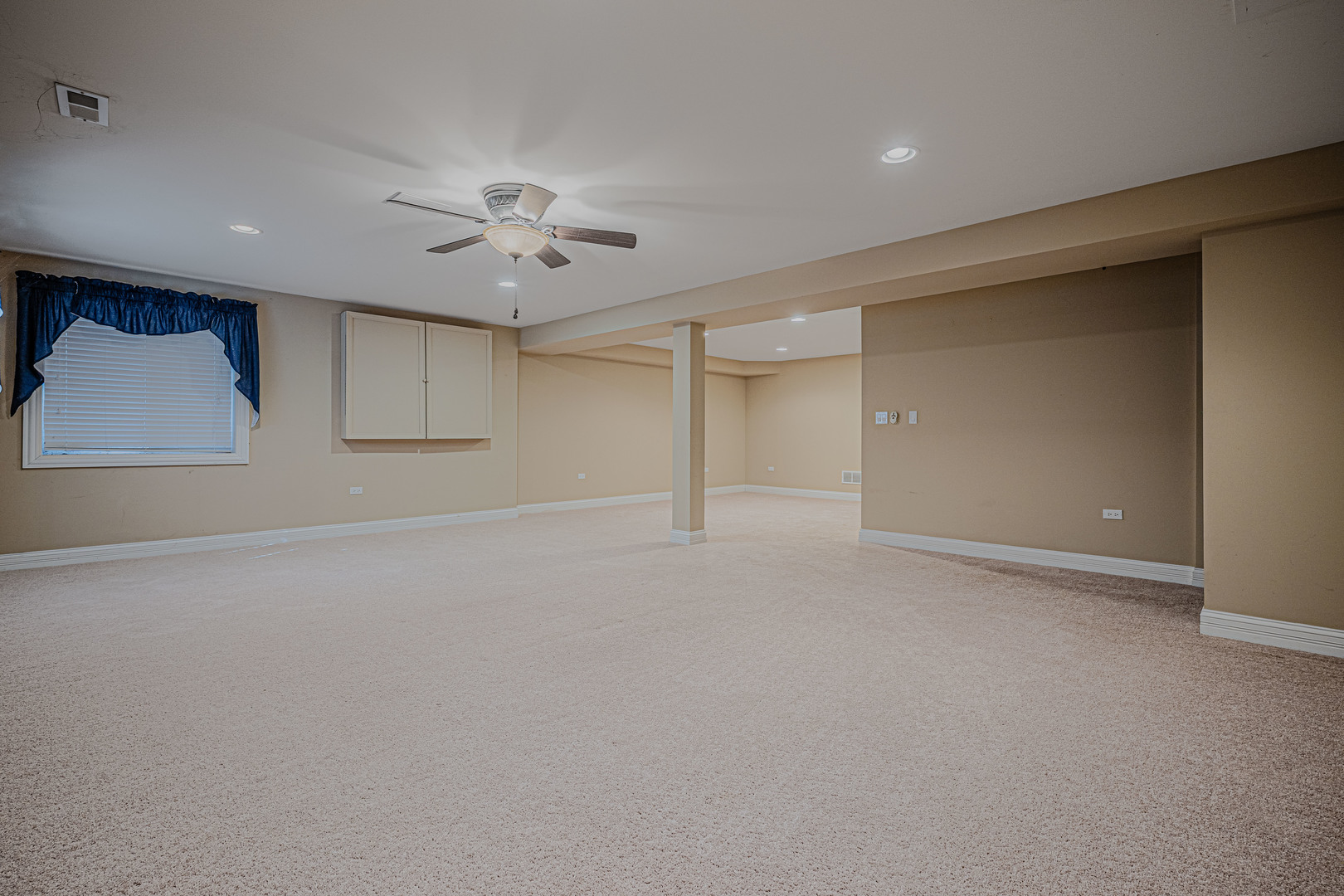 171 Partridge Lane Bartlett, IL 60103 - Photo 28 of 34 en empty room with ceiling fan and window