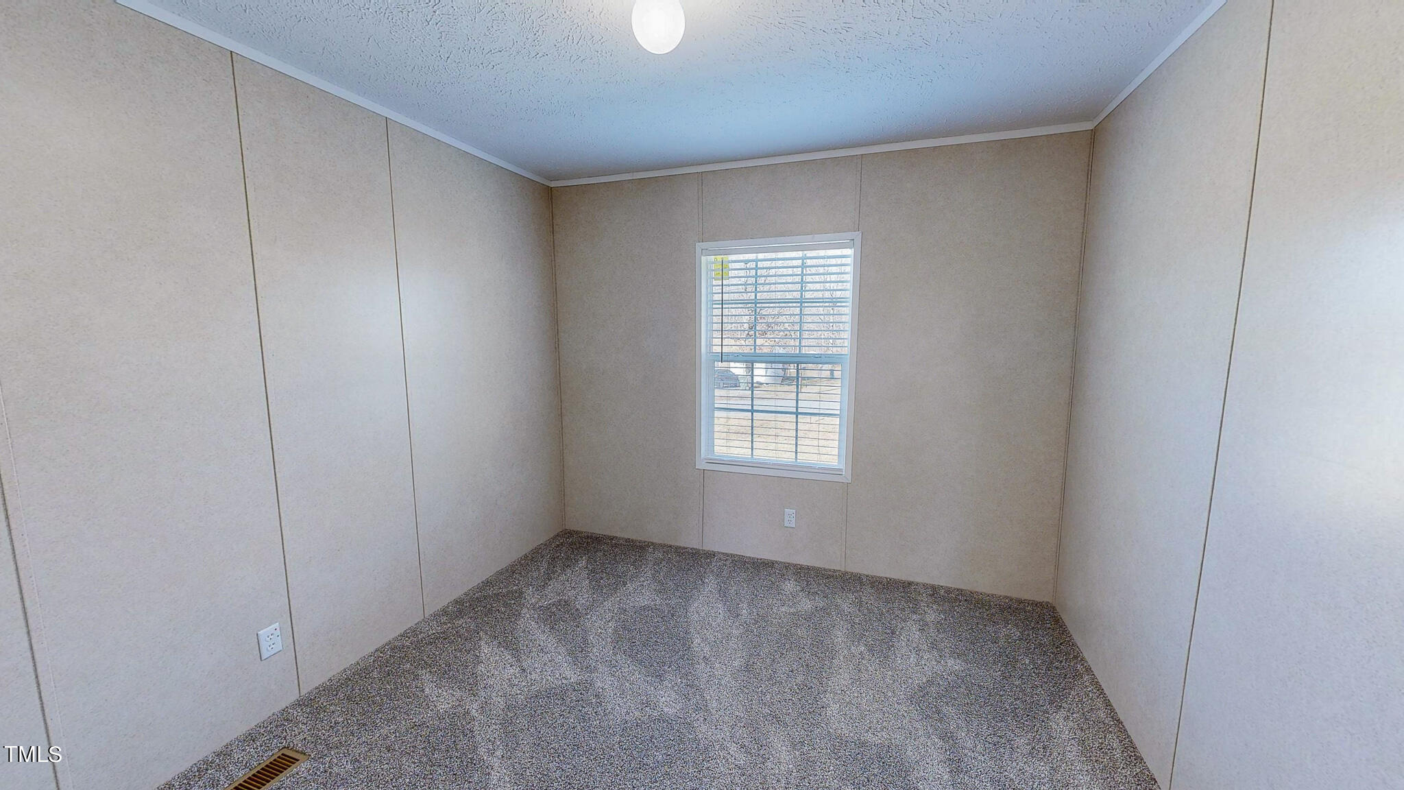 107 Azalea Drive Roxboro, NC 27573 - Photo 32 of 43 an empty room with a empty space and windows