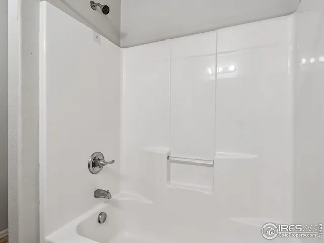 a front view of house with yard and swimming pool