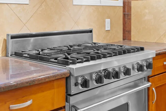 a close up of a stove top oven sitting on a counter