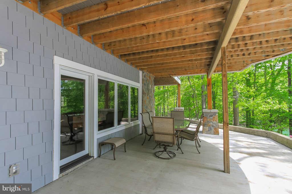 3749 Breaknock Road Bumpass, VA 23024 - Photo 7 of 29 covered patio on lower level