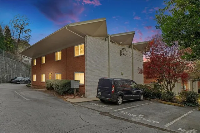 a car parked in front of a house