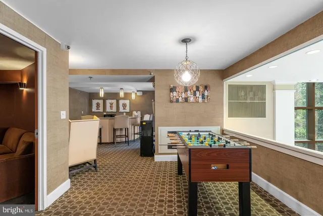 a room with furniture and a flat screen tv