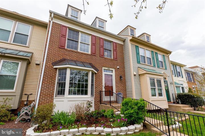 21186 Winding Brook Square Ashburn, VA 20147 - Photo 42 of 42 a front view of a building