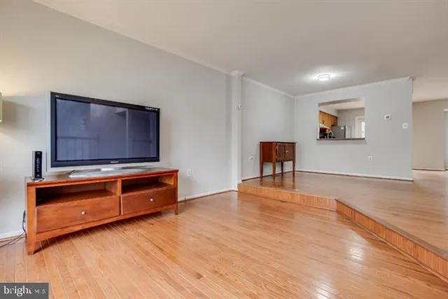 a room with furniture and flat screen tv